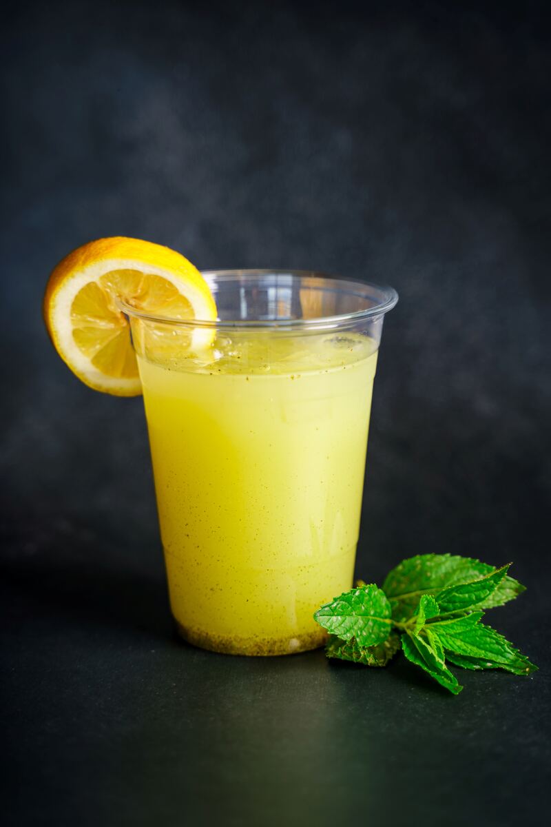 A glass of fresh mint lemonade with ice